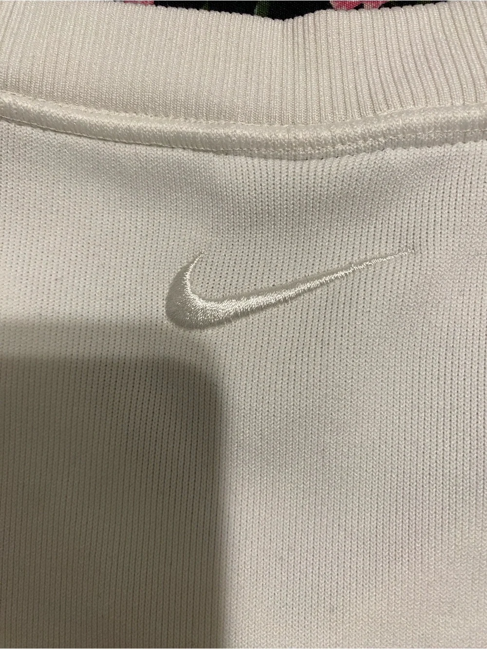 Nike Cream V‑Neck Sleeveless Knit Top Golfing